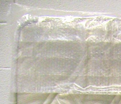 Alfatechnics Farbal verpakkingsmachine voor PE folie, 4-zijdig geseald en niet gekrompen verpakking. Extra produktbescherming door de laag bubbelfolie aan de binnen zijde.